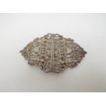 A Britton, Gould & Co., silver ornate belt buckle with heart detail, Birmingham 1898, 9cm long, 34g