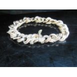 A gold fancy link bracelet stamped 15, 25g