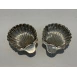 A pair of silver scallop form dishes, London 1891, 13cm long, 107g