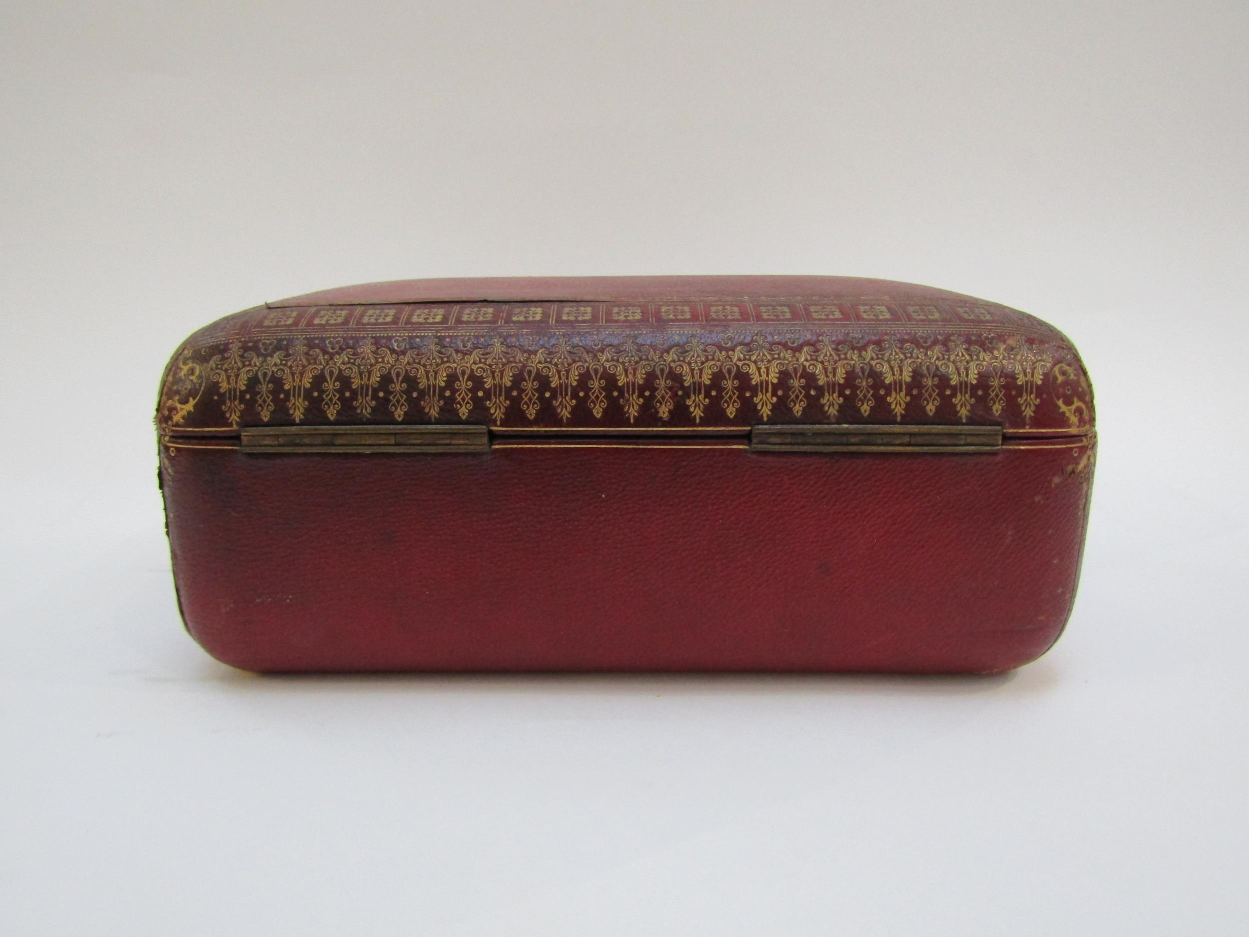 A 19th Century red leather casket with gilt tooled decoration to the exterior. With key. 27cm x 17cm - Image 15 of 22