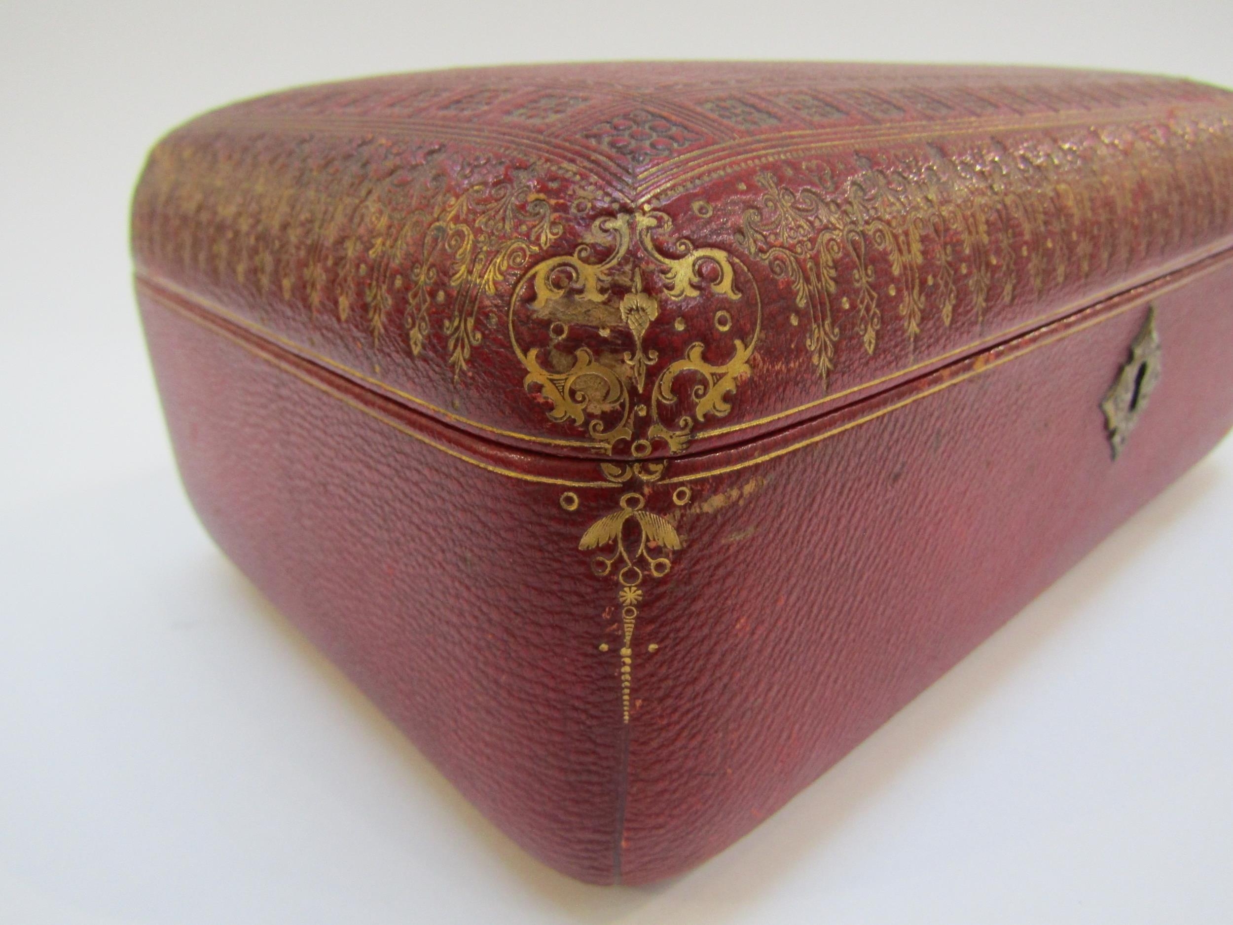 A 19th Century red leather casket with gilt tooled decoration to the exterior. With key. 27cm x 17cm - Image 8 of 22