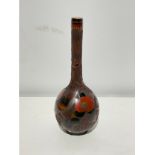 An early 20th Century Japanese bark-effect bottle vase with details picked out in cloisonné