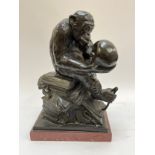 After Hugo Wolfgang Rheinhold (1852-1900): A bronze figure "Affe Mit Shadel", Ape with skull, Darwin