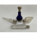 Four scent bottles including Bristol blue enriched with gilt star pattern a/f, another frosted
