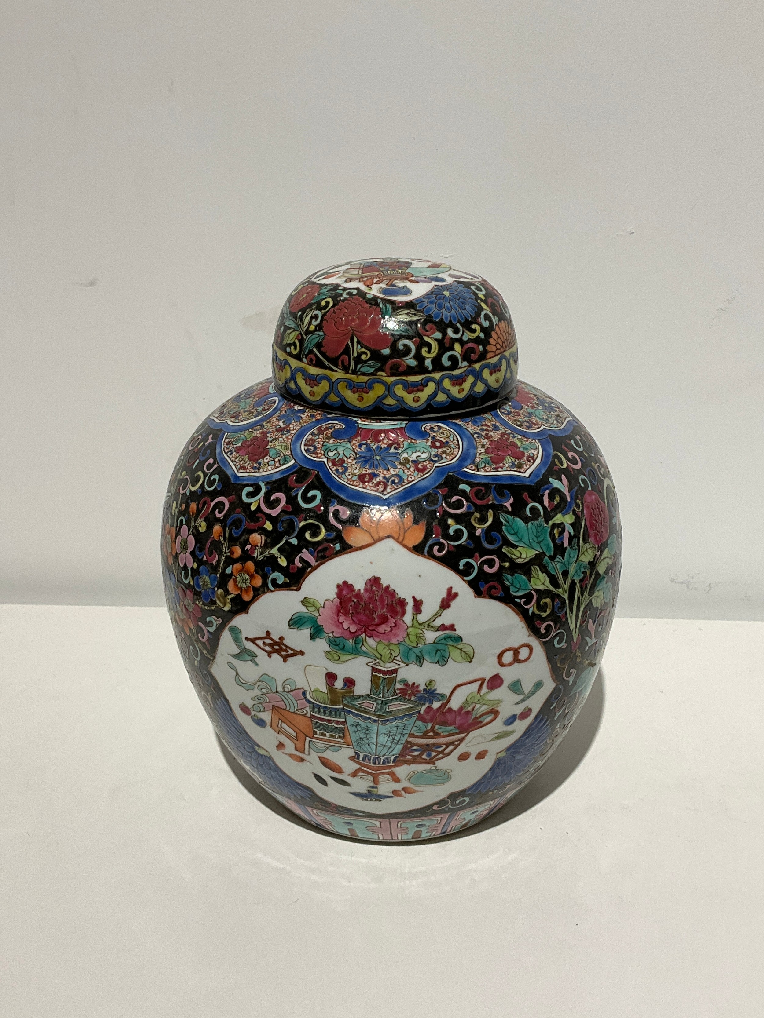 A 19th Century Chinese black ground large ginger jar and lid, 27cm tall