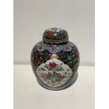 A 19th Century Chinese black ground large ginger jar and lid, 27cm tall