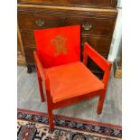 A Prince of Wales Investiture chair frame, as designed by Lord Snowdon, red stained plywood bentwood