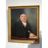 A 19th Century oil on canvas portrait of a gentleman seated with quill pen. Set in an ornate gesso