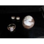 A 9ct gold cameo ring, size J, a cameo brooch and pair of earrings, 13.9g total