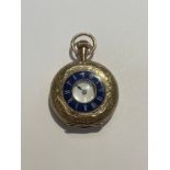 A WWC. Waltham, Mass small half hunter pocket watch with black Roman numerals to the white enamel
