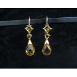 A pair of citrine tear drop earrings in 9ct gold, 3.5cm drop, 2.9g