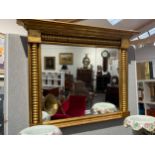 A 19th Century giltwood wall hanging mirror with bobbin turned decoration, 65cm x 83cm