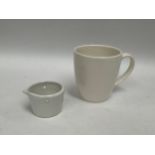 A WWII German Kriegsmarine U-Boat mug and milk jug in white. The mug marked with Bauscher Weiden