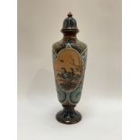 A Doulton Lambeth lidded vase incised with sgraffito panels of geese. Monogrammed "JEB", 43cm tall