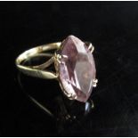 A gold ring set with a lozenge shaped amethyst. Size K, 2.5g