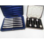 A cased set of six William Suckling Ltd silver coffee bean spoons, Birmingham 1924 and cased set