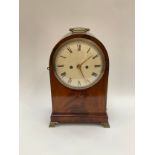 A Regency mahogany mantel clock, twin fusee movement with rack and snail striking and bell and