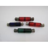 Four coloured glass double ended scent bottles including ruby, emerald and Bristol blue glass