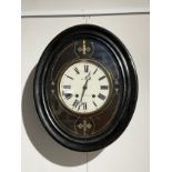 A 19th Century French vineyard clock, ebonised case, oval form