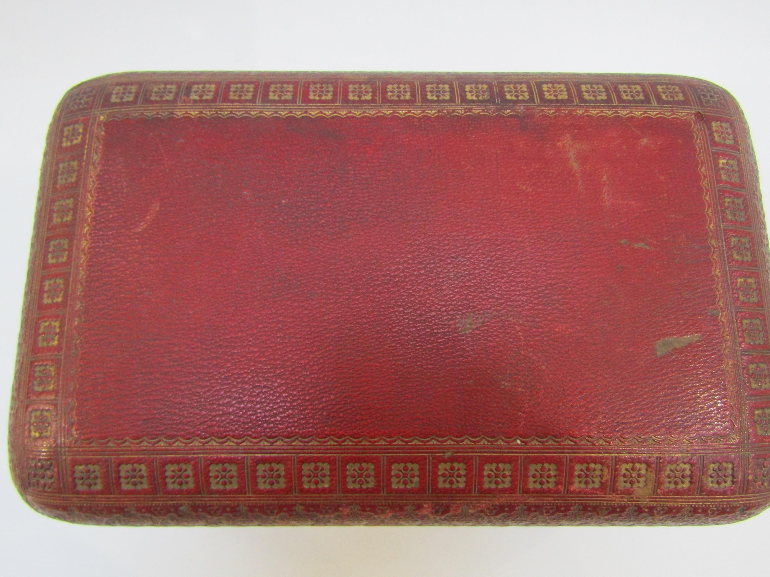 A 19th Century red leather casket with gilt tooled decoration to the exterior. With key. 27cm x 17cm - Image 10 of 22