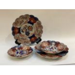 Four Japanese Imari plates, one a/f