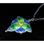 An Art Nouveau silver enamelled pendant in bright blues and greens, hung on chain, stamped S&F