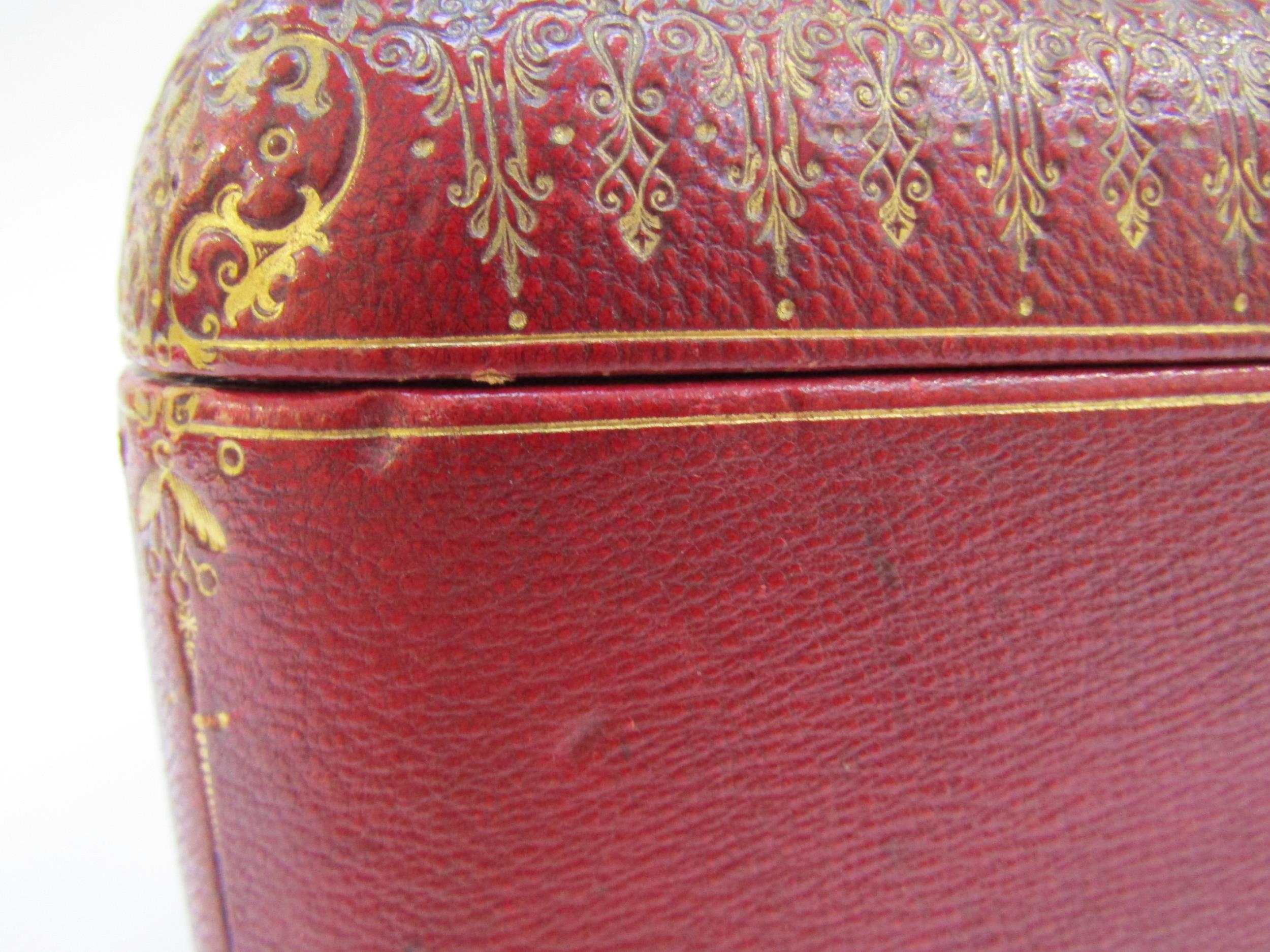 A 19th Century red leather casket with gilt tooled decoration to the exterior. With key. 27cm x 17cm - Image 5 of 22