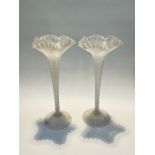 A pair of Nailsea white and clear glass large trumpet vases