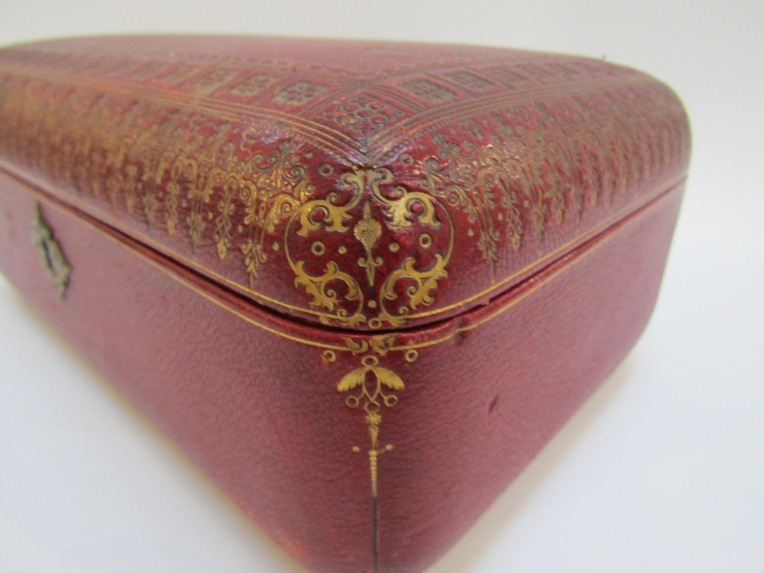 A 19th Century red leather casket with gilt tooled decoration to the exterior. With key. 27cm x 17cm - Image 3 of 22
