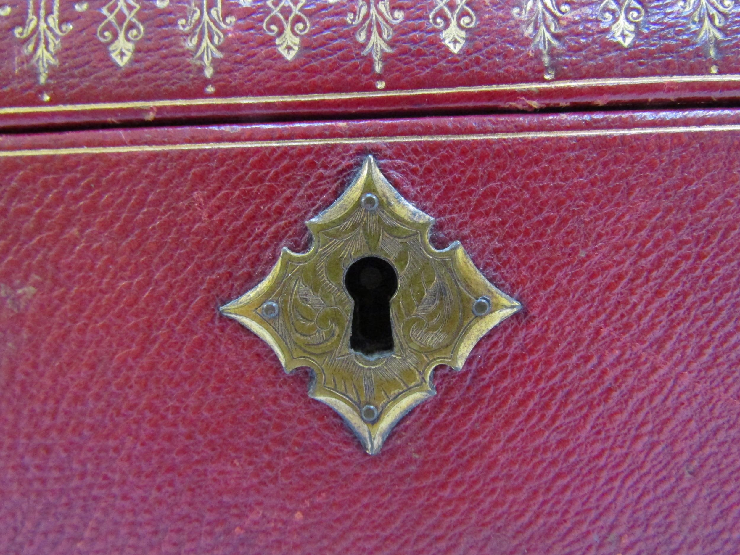 A 19th Century red leather casket with gilt tooled decoration to the exterior. With key. 27cm x 17cm - Image 22 of 22