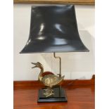 A modern brass duck figural lamp with black shade, 73cm tall