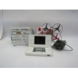 A Nintendo DS with games and a Syma RC gyrocopter