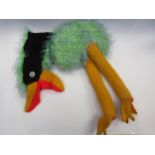 An emu soft toy with hand puppet head