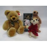 Three soft filled toy meerkats and a Simply Soft Collection bear
