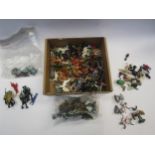 A collection of plastic and lead figures including Britains Swoppets 15th Century Knights etc