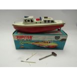A boxed Sutcliffe Model 'Jupiter' Ocean Pilot Cruiser tinplate clockwork boat