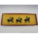 A boxed set of three hand painted Life Guards Blues and Royals mounted soldiers
