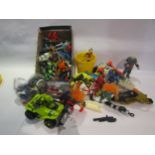 A collection of 1990's plastic action figures, vehicles, weapons and accessories including Hasbro GI