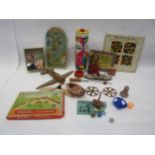 Mixed vintage toys including spinning tops, Tri-ang Wakouwa dog with stick (a/f), Circus bagatelle