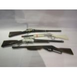 Eight assorted playworn plastic and diecast toy rifles including Laramie Rustler Repeater,