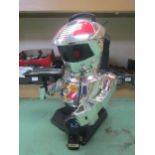 A Scooter 2000 plastic battery operated robot, with remote