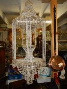 A large 'shell' chandelier in good condition (144 cm drop).