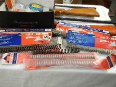 A quantity of air gun springs and a box of some rare pellets.