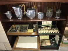 A good lot of cutlery (some boxed) and a picquot teaset etc.