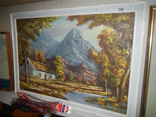 A signed oil on board mountain scene. Collect only.