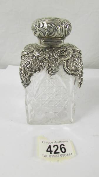A Victorian silver overlaid laroe scent bottle, 1896, William Richard Corke. Overall in good