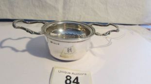 A silver tea strainer. weight 95g