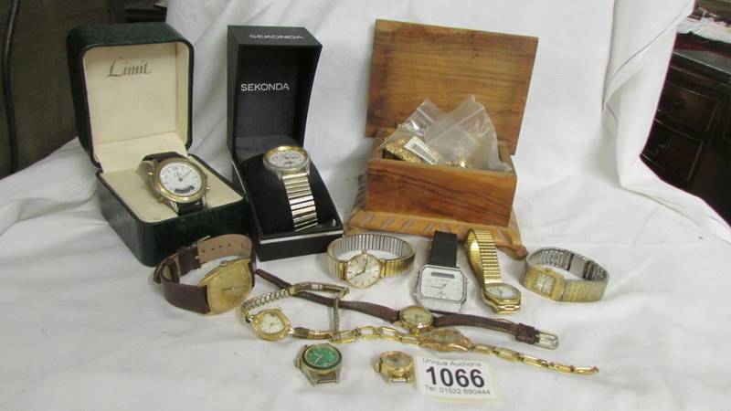 A mixed lot of wrist watches etc.,