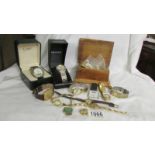 A mixed lot of wrist watches etc.,
