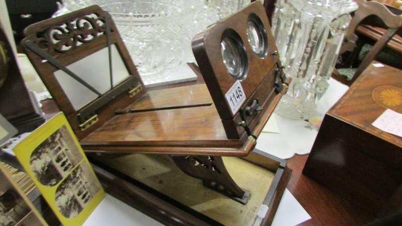 A good Victorian stereoscopic viewer marked with Crown Treasury, complete with box of cards. in - Image 2 of 33